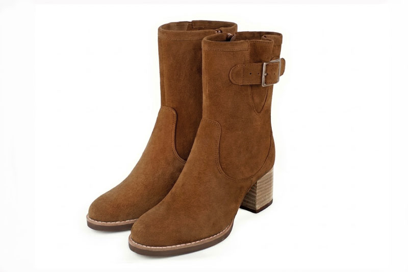 Classic leather ankle boots featuring adjustable side buckles and sleek hardware for secure support and timeless everyday style, in cognac leather with round toe and mid block heel